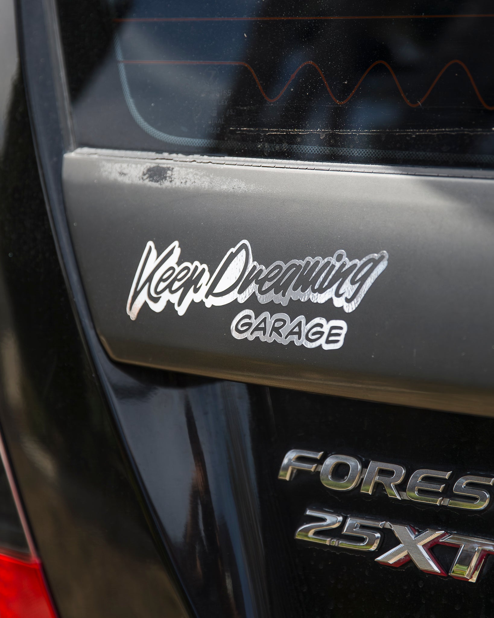 KEEP DREAMING GARAGE - CHROME STICKER