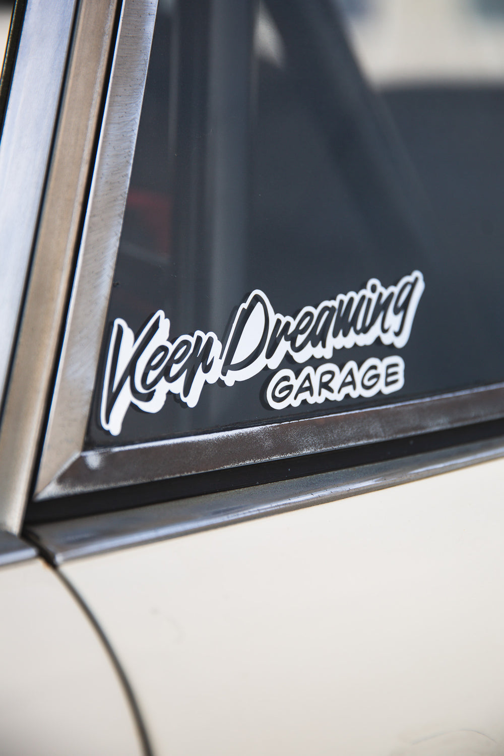 KEEP DREAMING GARAGE - CHROME STICKER